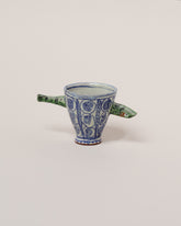 Maggie Boyd Two Green Sardine Cup on light color background.