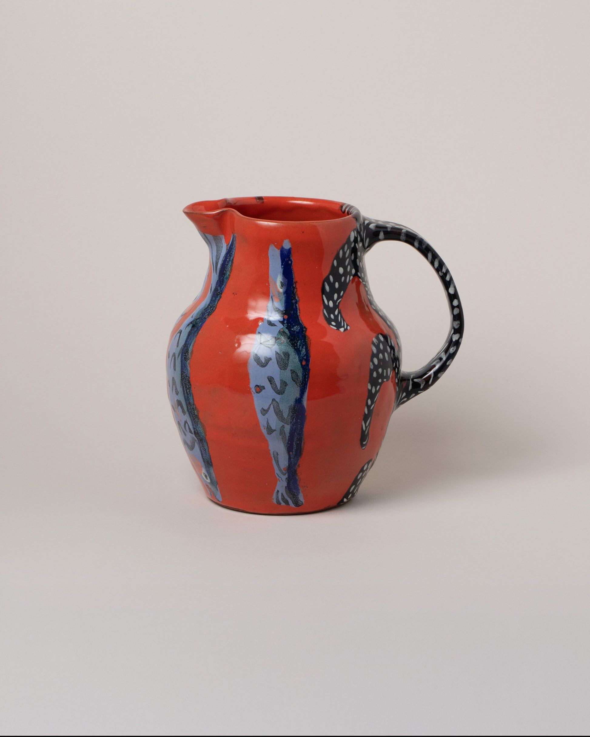 Maggie Boyd Red Hot Sardine Pitcher on light color background.