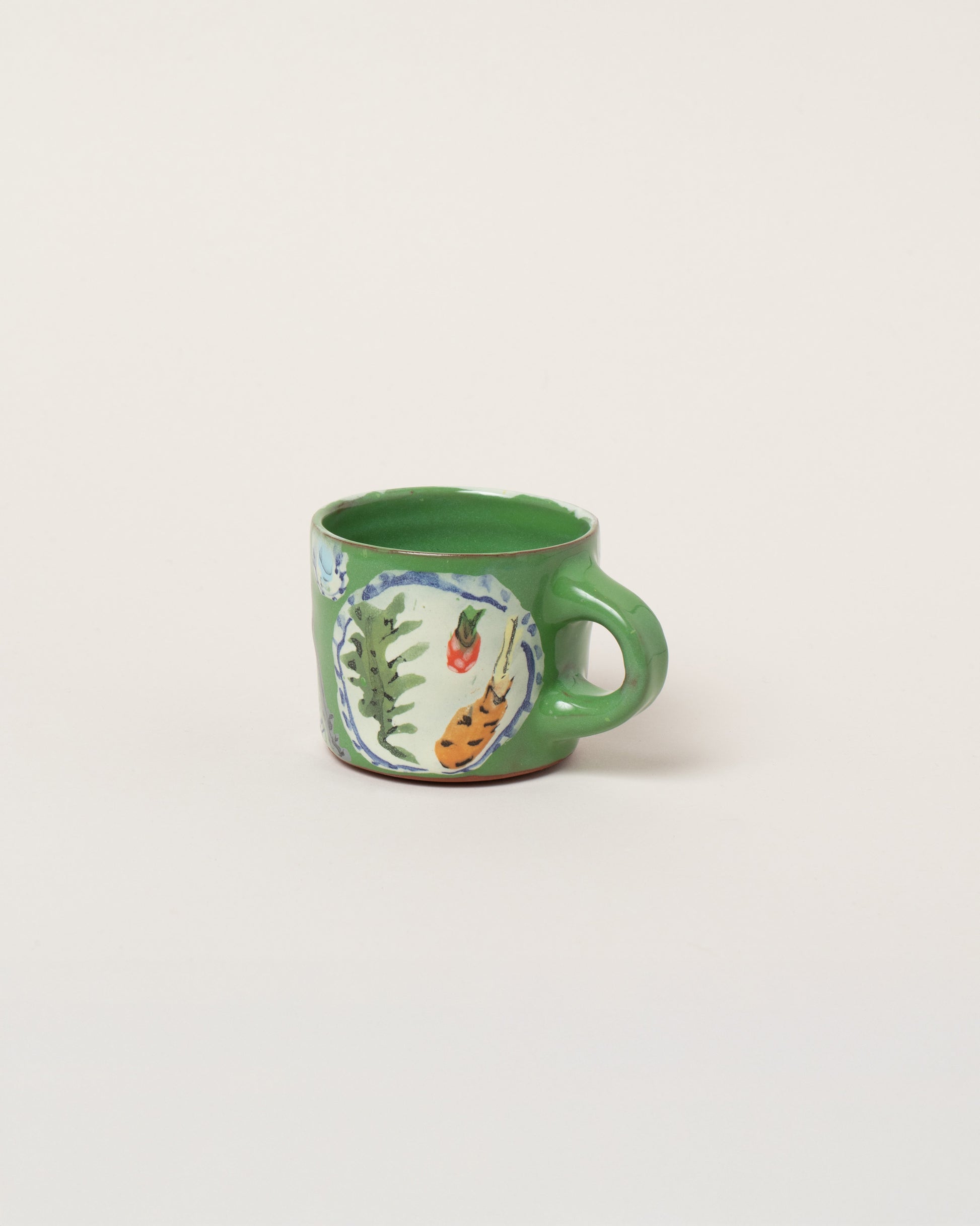 Maggie Boyd One View From A Table Small Mug on light color background.