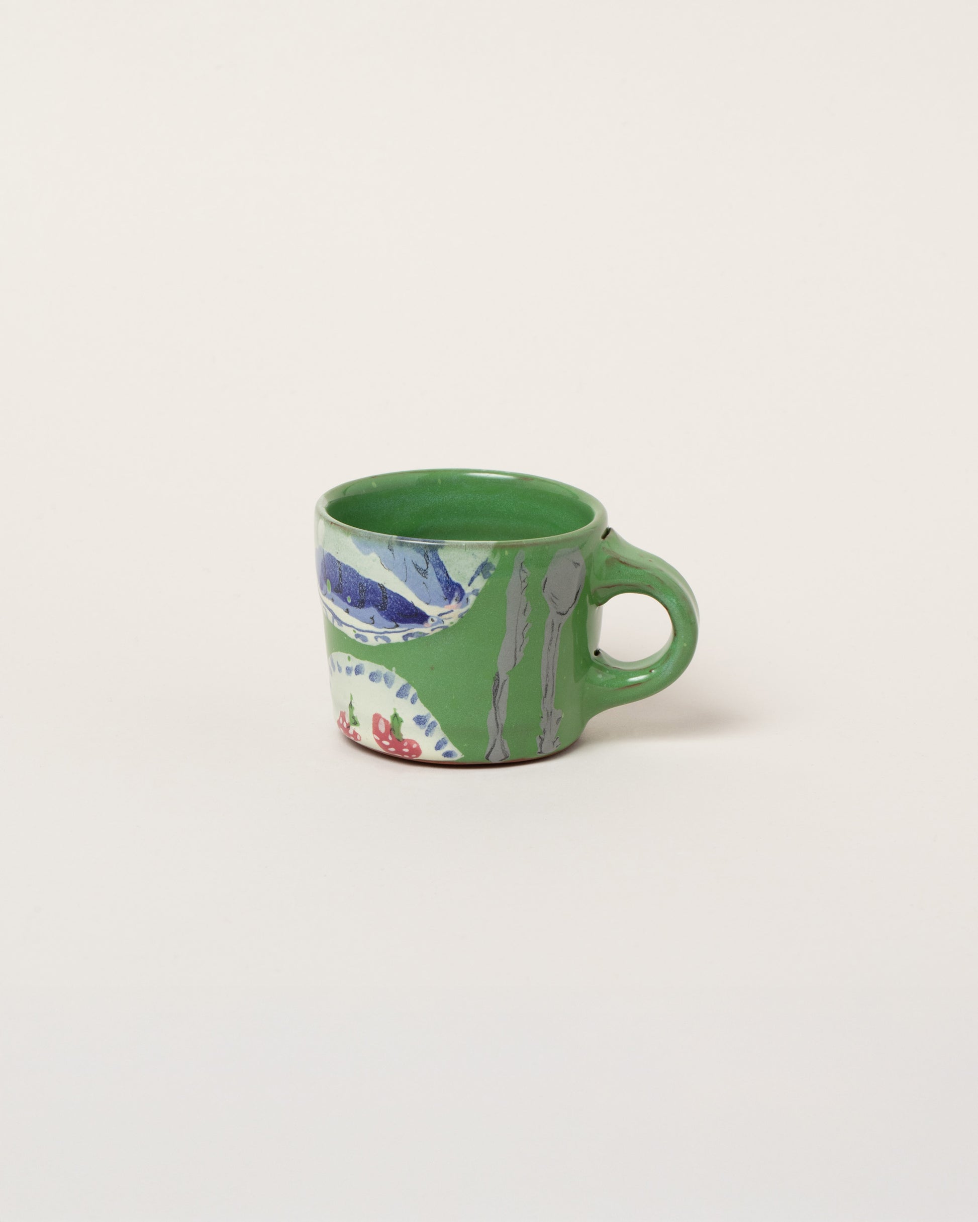 Maggie Boyd Two View From A Table Small Mug on light color background.