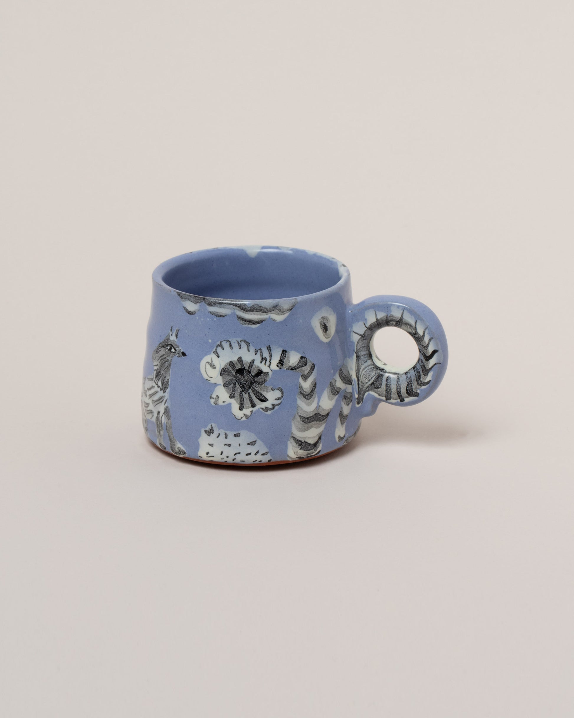 Maggie Boyd Birds & Flowers Mug on light color background.