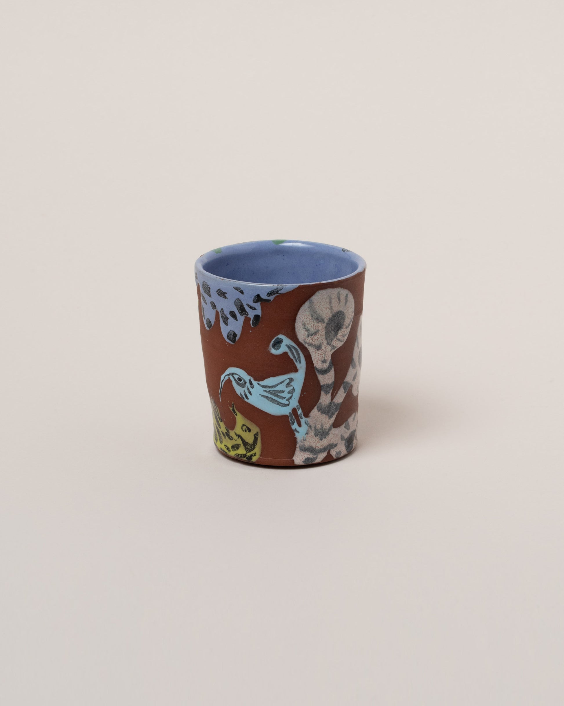 Maggie Boyd Witch Landscape Tumbler on light color background.