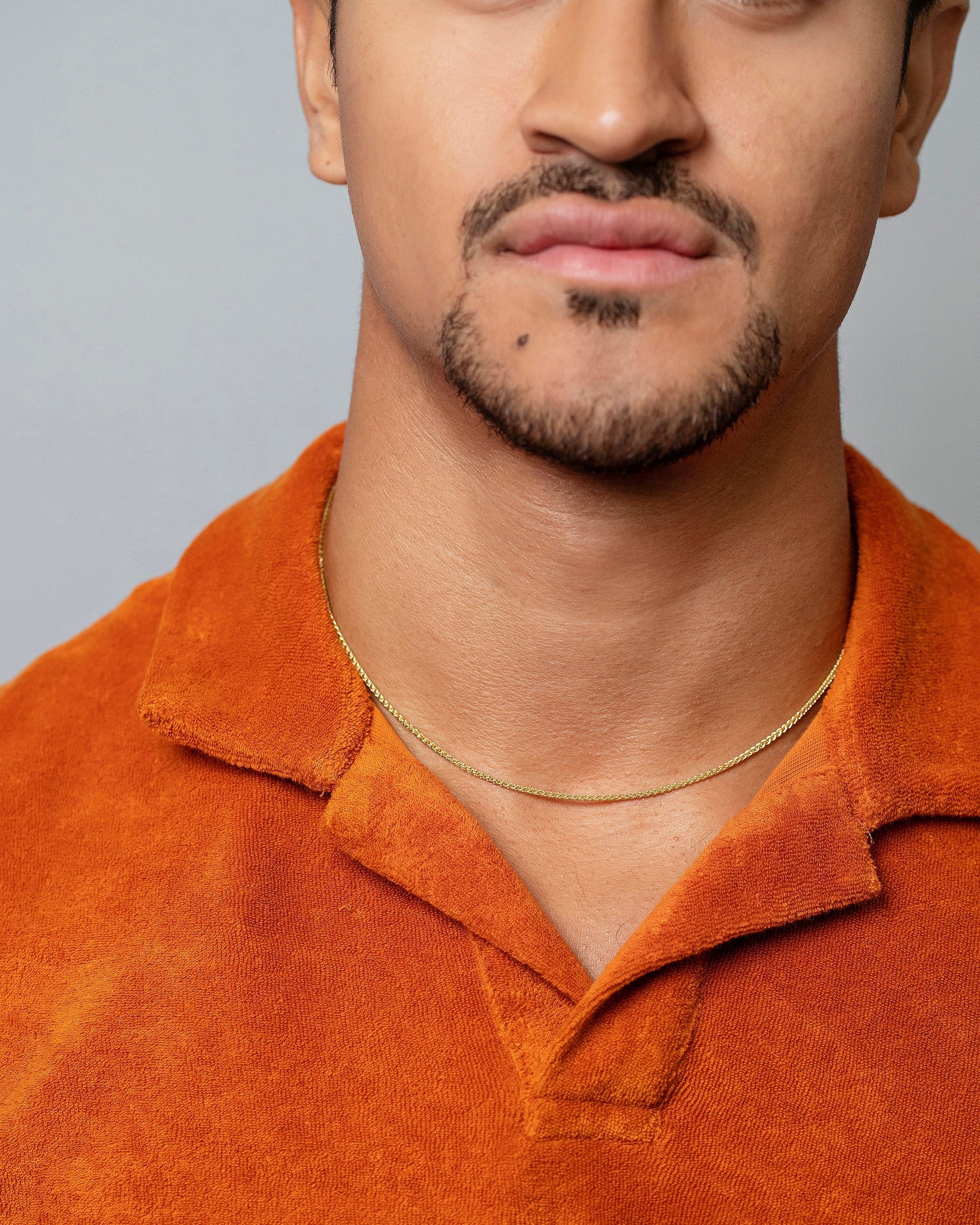 Cycle Chain Necklace on male model.