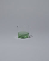 Ichendorf Milano Green/Clear Light Colore Water Glass on light color background.