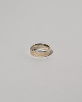 6mm White & Yellow Gold Inlaid Band on light color background.