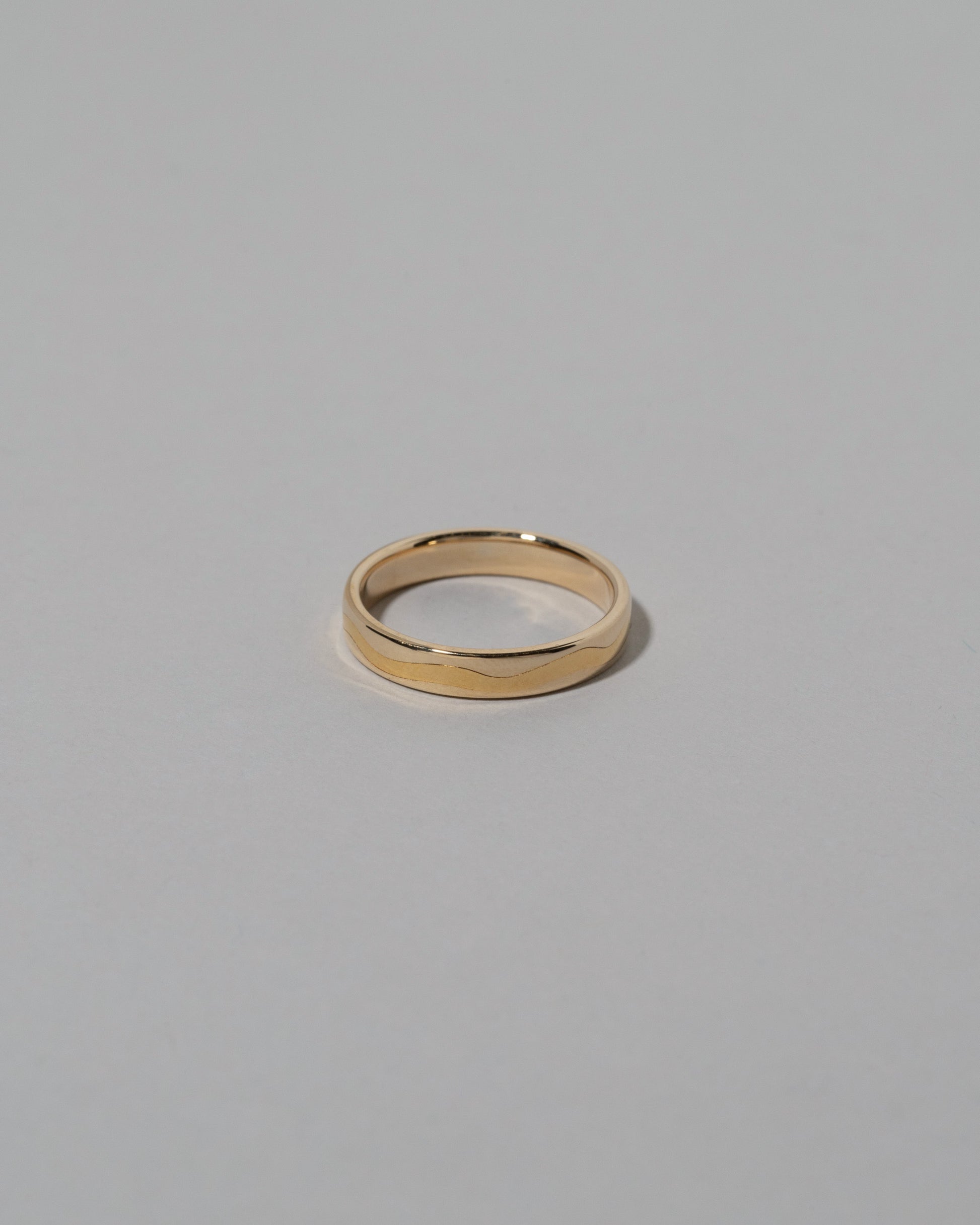 4mm Yellow Gold Inlaid Band on light color background.