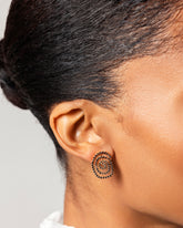 Right Black Diamond Cycle of Rebirth Earring Single worn on on model.