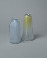 Group of BaleFire Glass Cloud Large Suspension Vases on light color background.