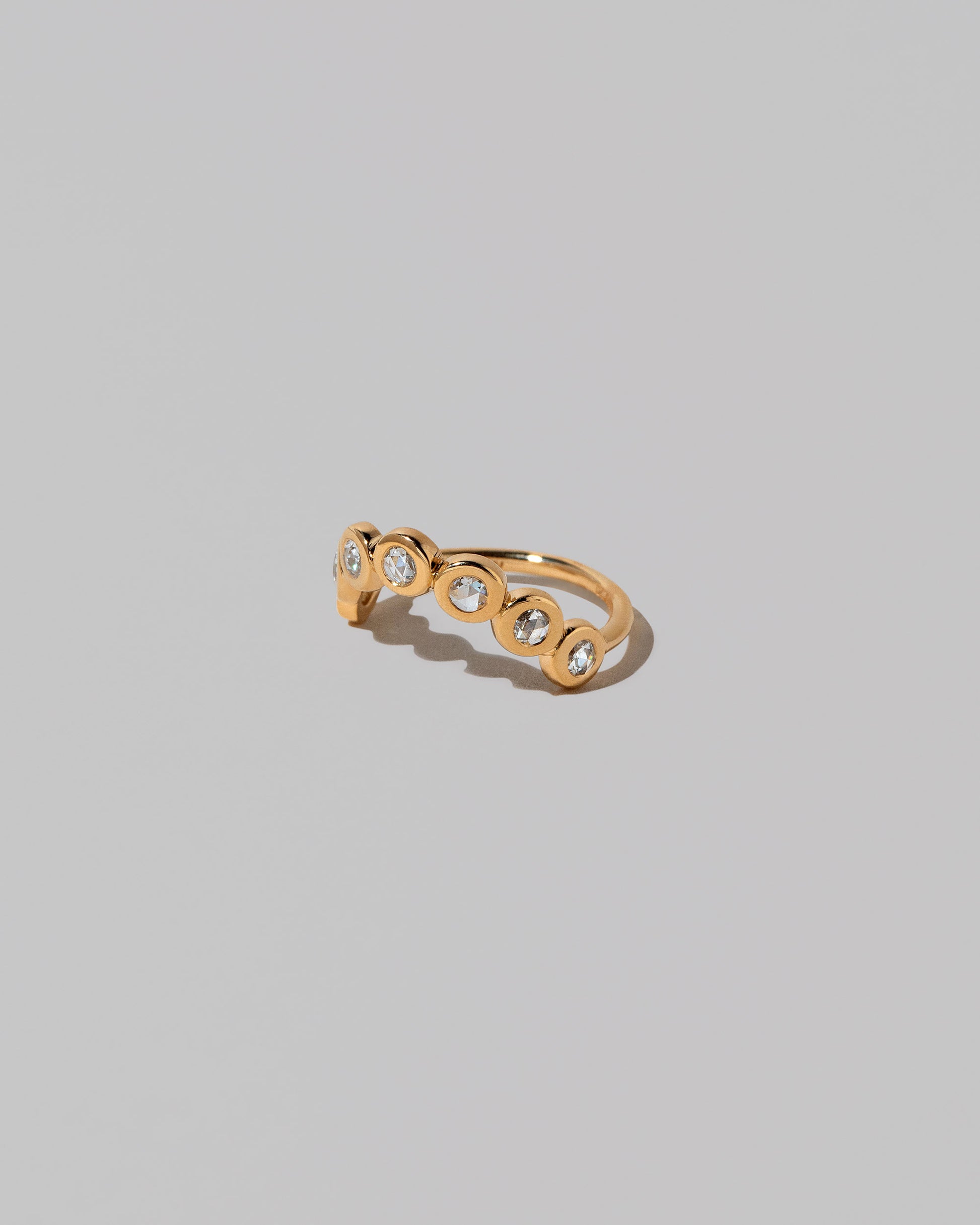 View from the side of the Momentum Ring on light color background.