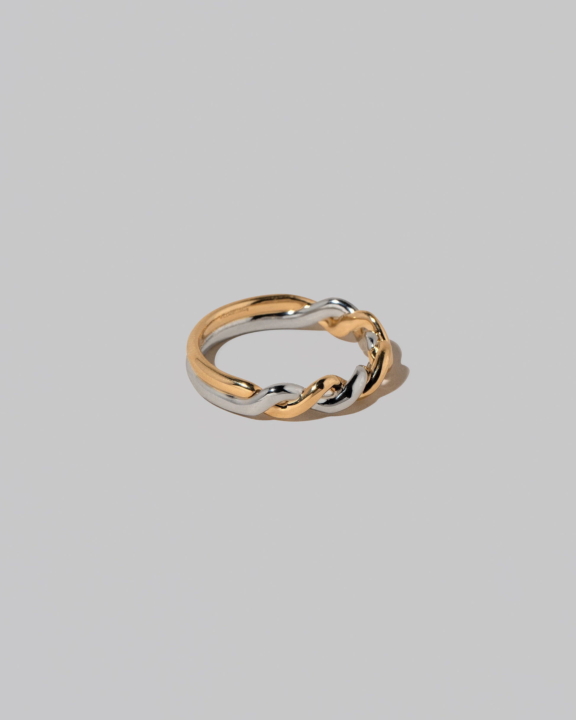 View from the side of the Two Tone Twist Band on light color background.