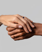 Gold 5mm Enamel Band in Sunkist and Gold 6mm Enamel Band in Cobalt on models.