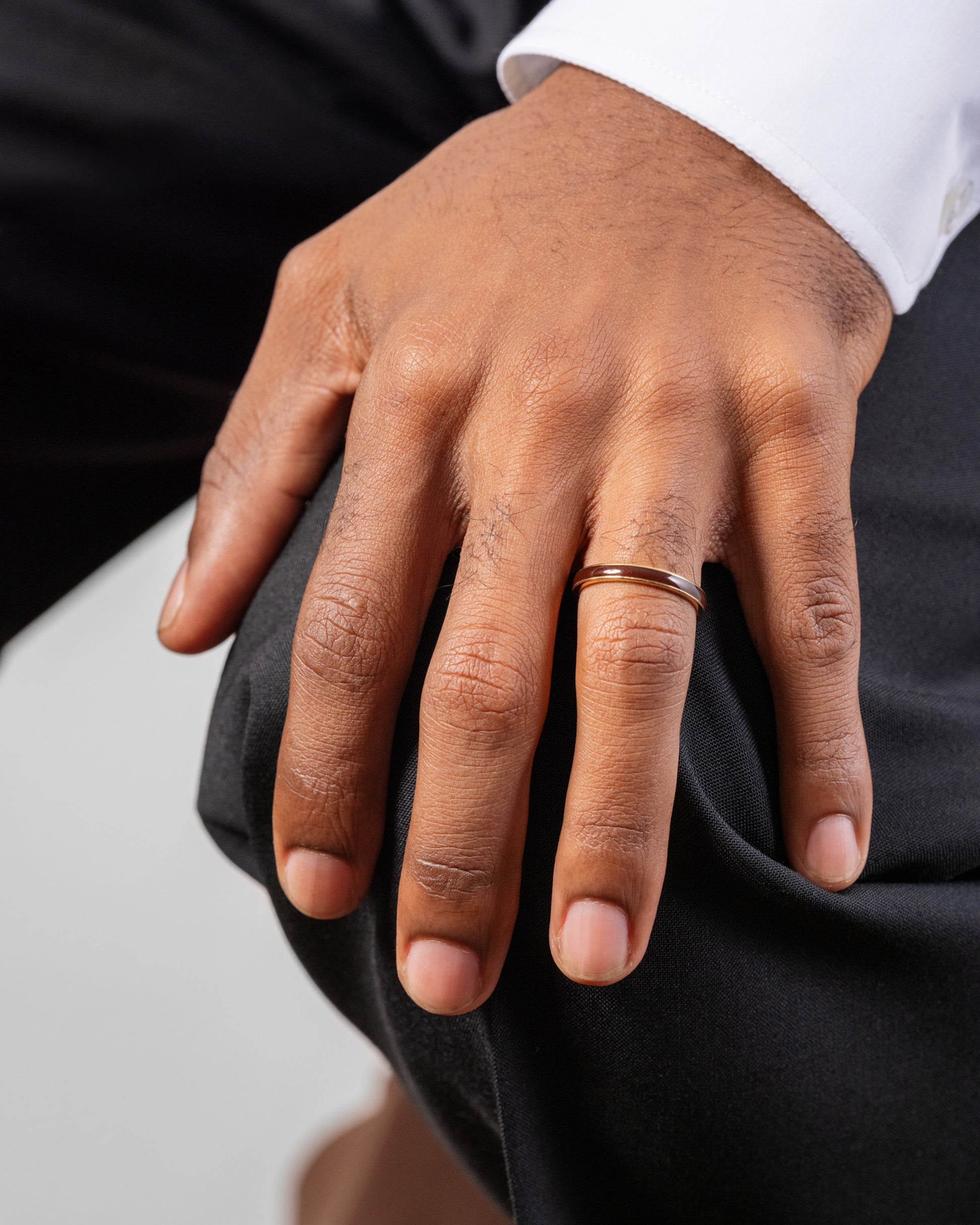 Gold 3mm Enamel Band in Burnt Umber on male model.