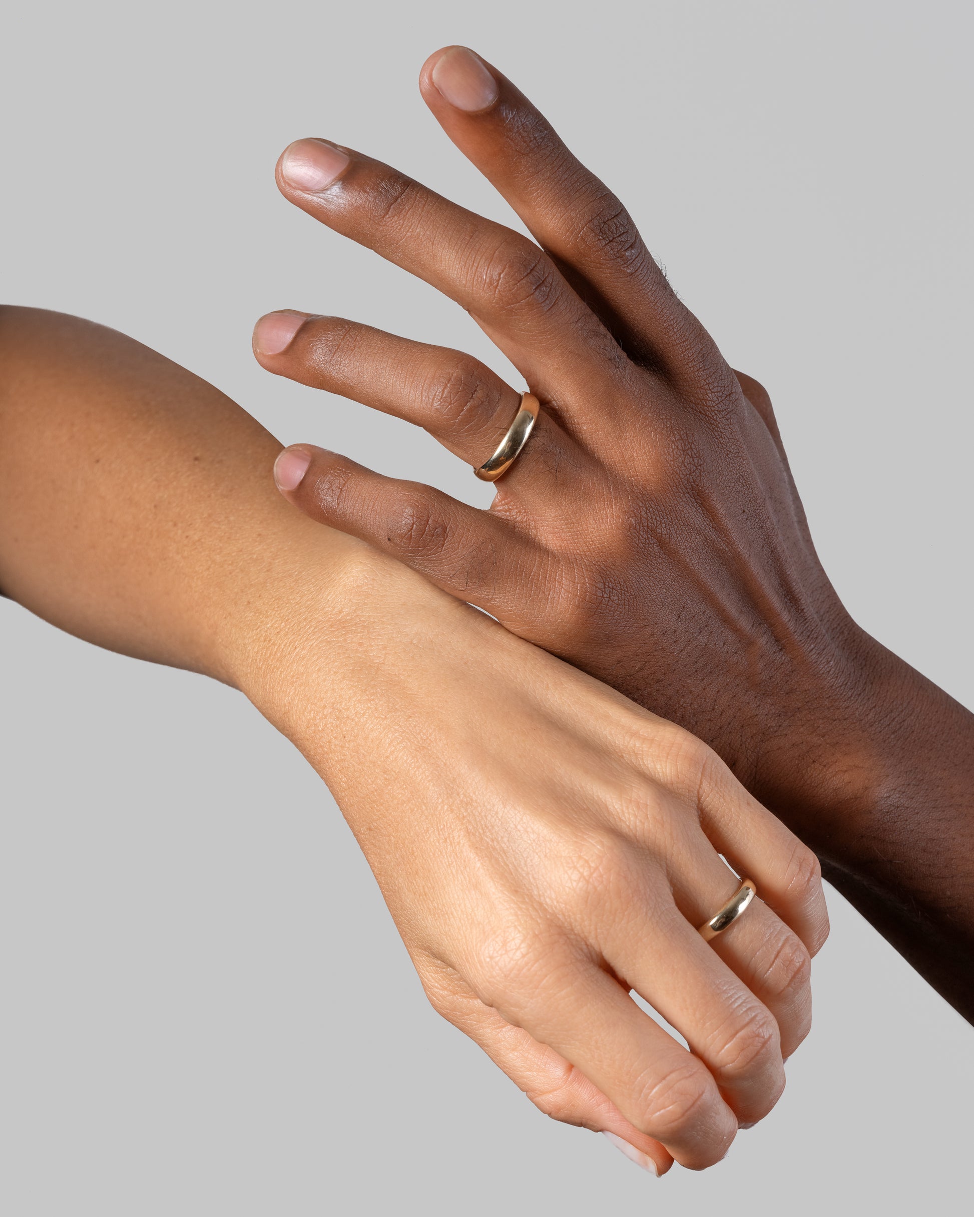 Gold 4mm Half Round Bands on models.