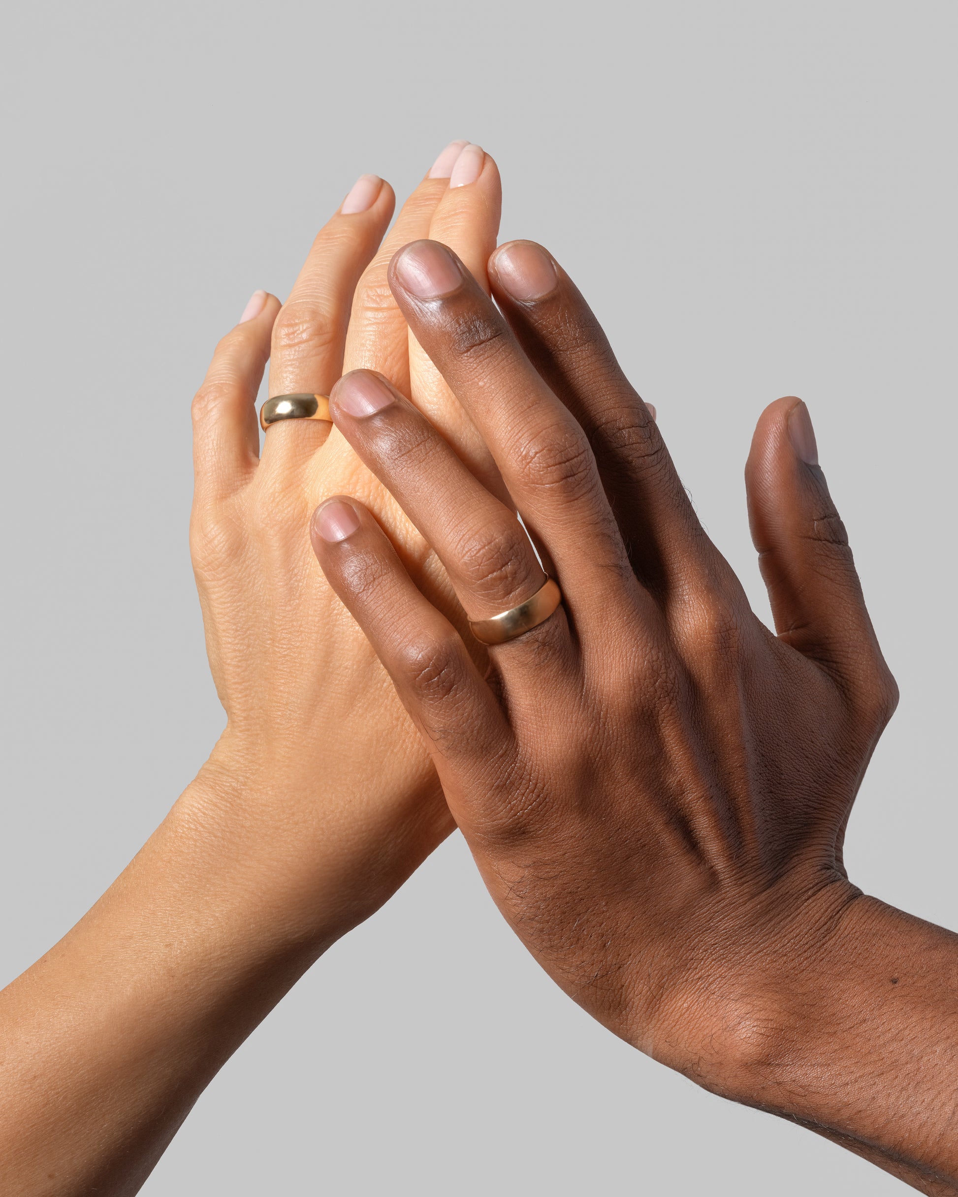 Gold 6mm Half Round Bands on models.