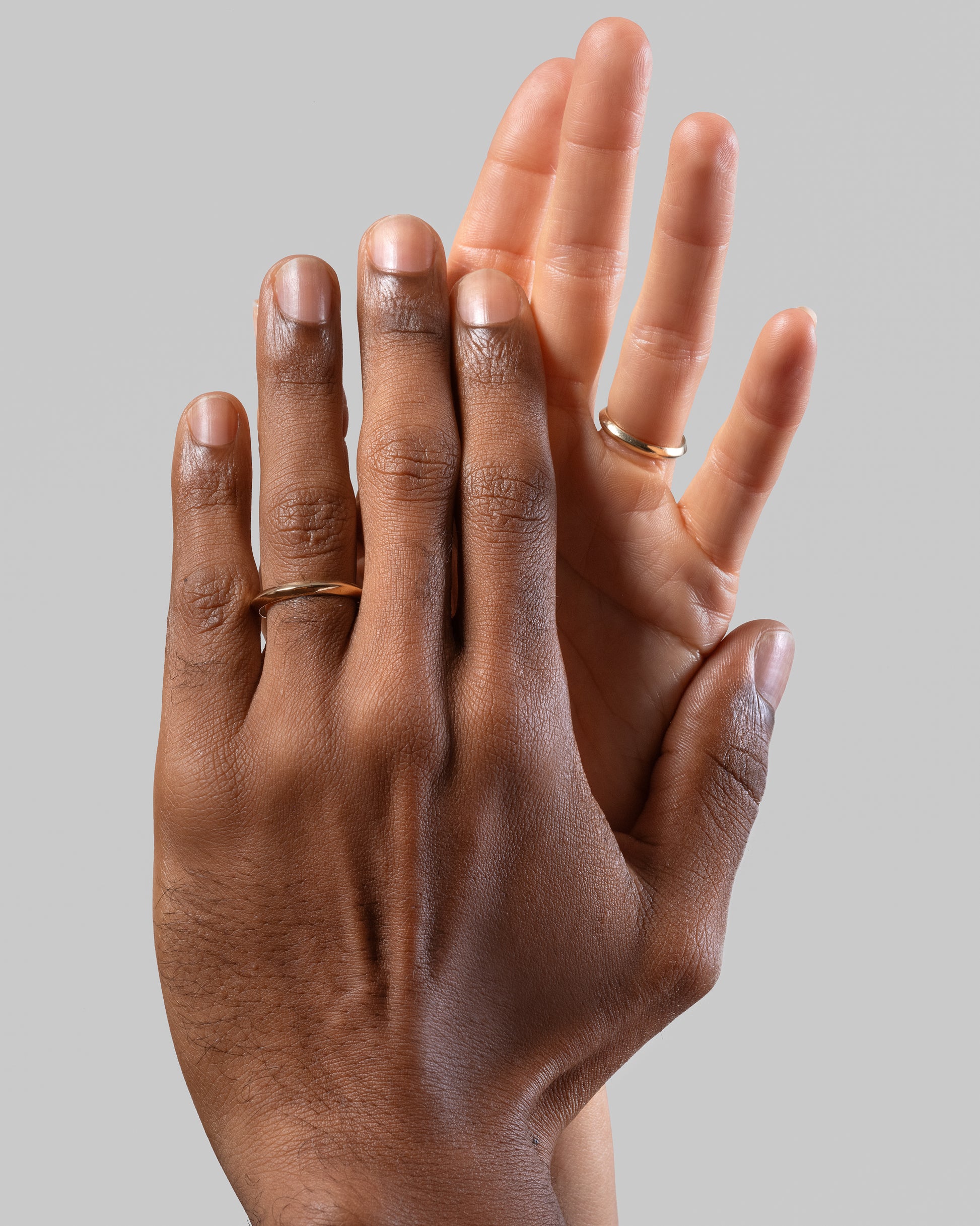 Gold 3mm Knife Edge Bands on models.