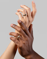 Gold 6mm Knife Edge Bands on models.