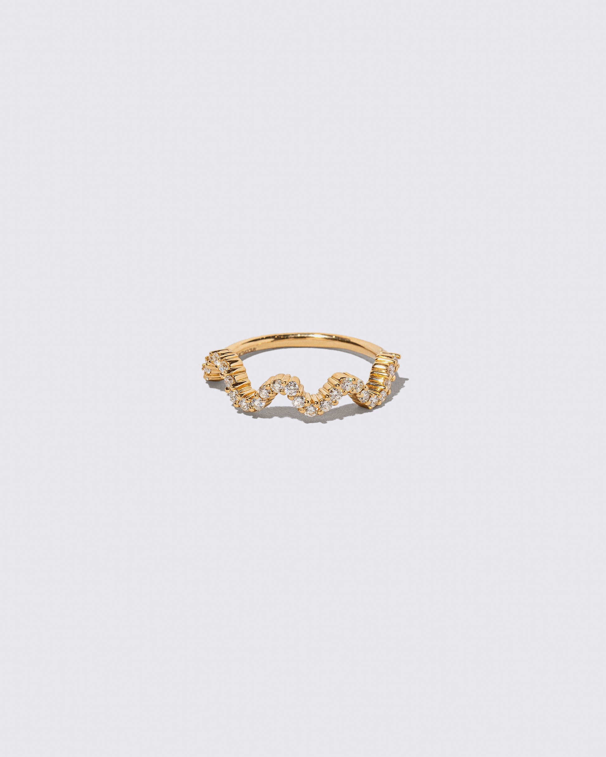 Gold White Diamond Low Tide Band on light color background.