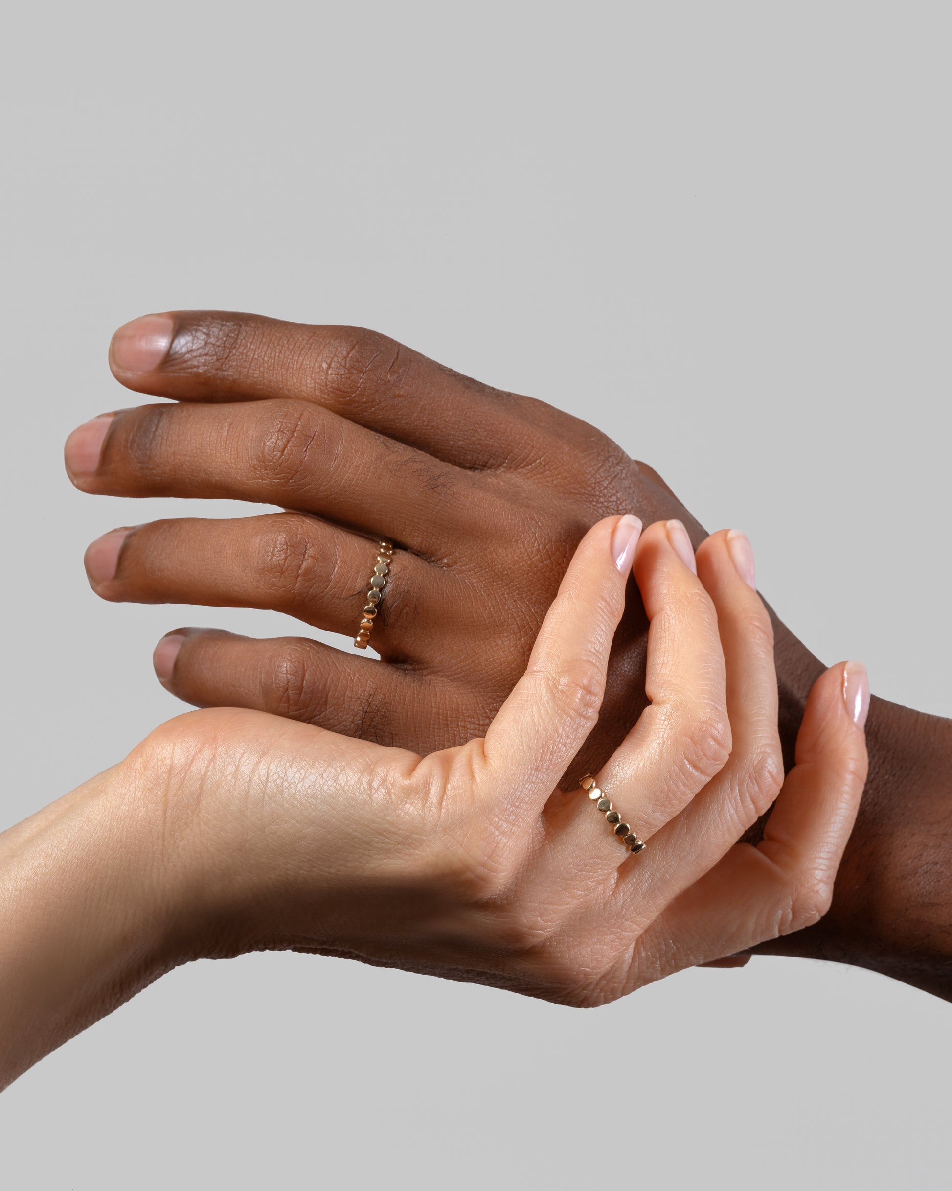 Gold One Tier Mimosa Bands on models.