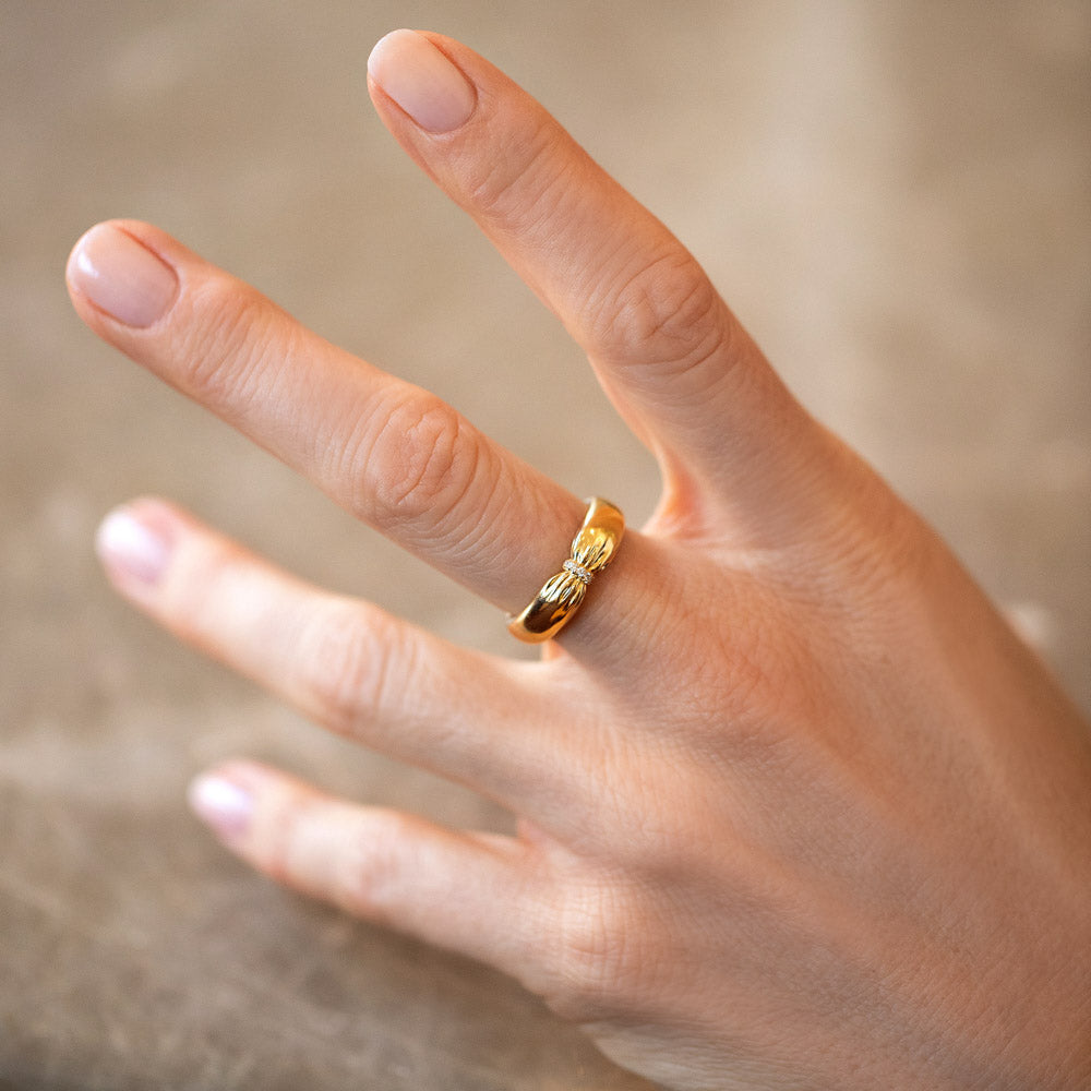 product_details::Gold Pavé Pinch Band on model.