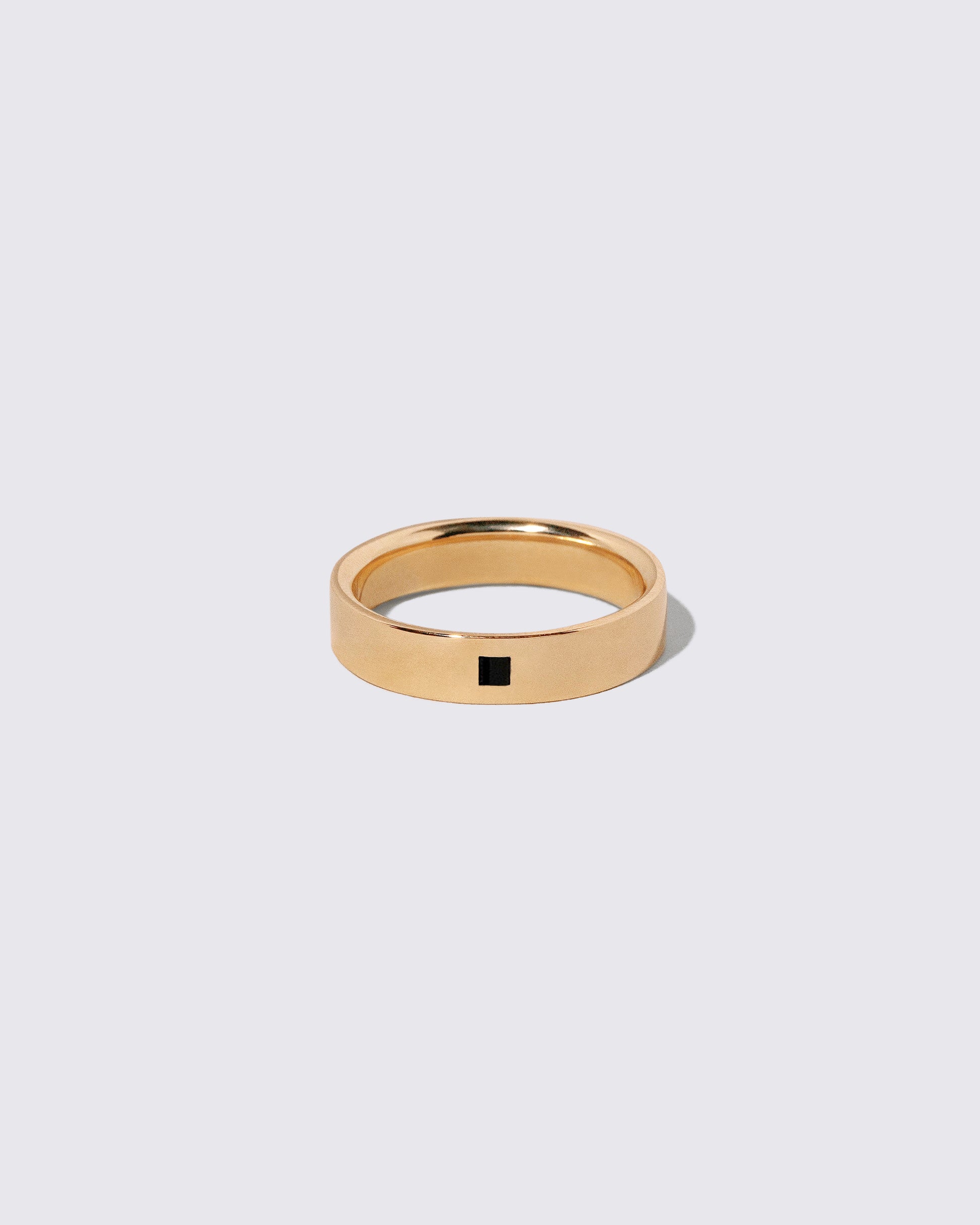 Gold Black Spinel 5mm Square Cut Piet Band on light color background.