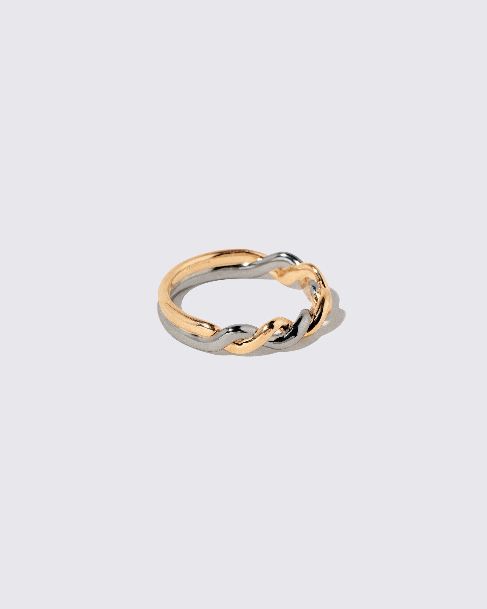 View from the side of the Two Tone Twist Band on light color background.