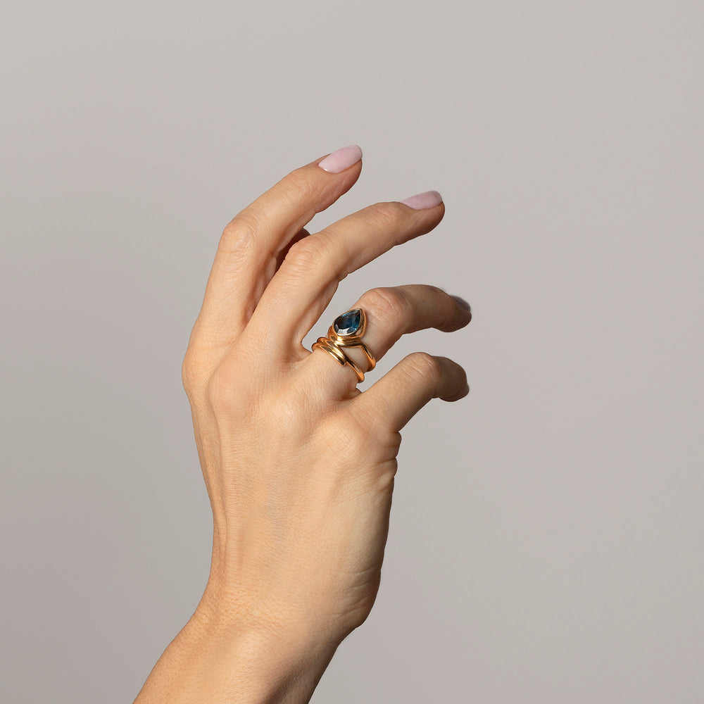 product_details::Editorial photo of model wearing the Bell Ring.