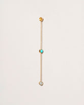 Birthstone Two-Drop Single Earring on light color background.