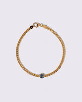 Bicolor Sapphire Fold Bracelet on light color background.