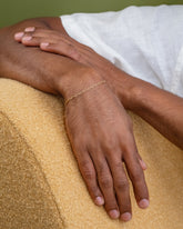 Hot Dog Chain Bracelet on male model.