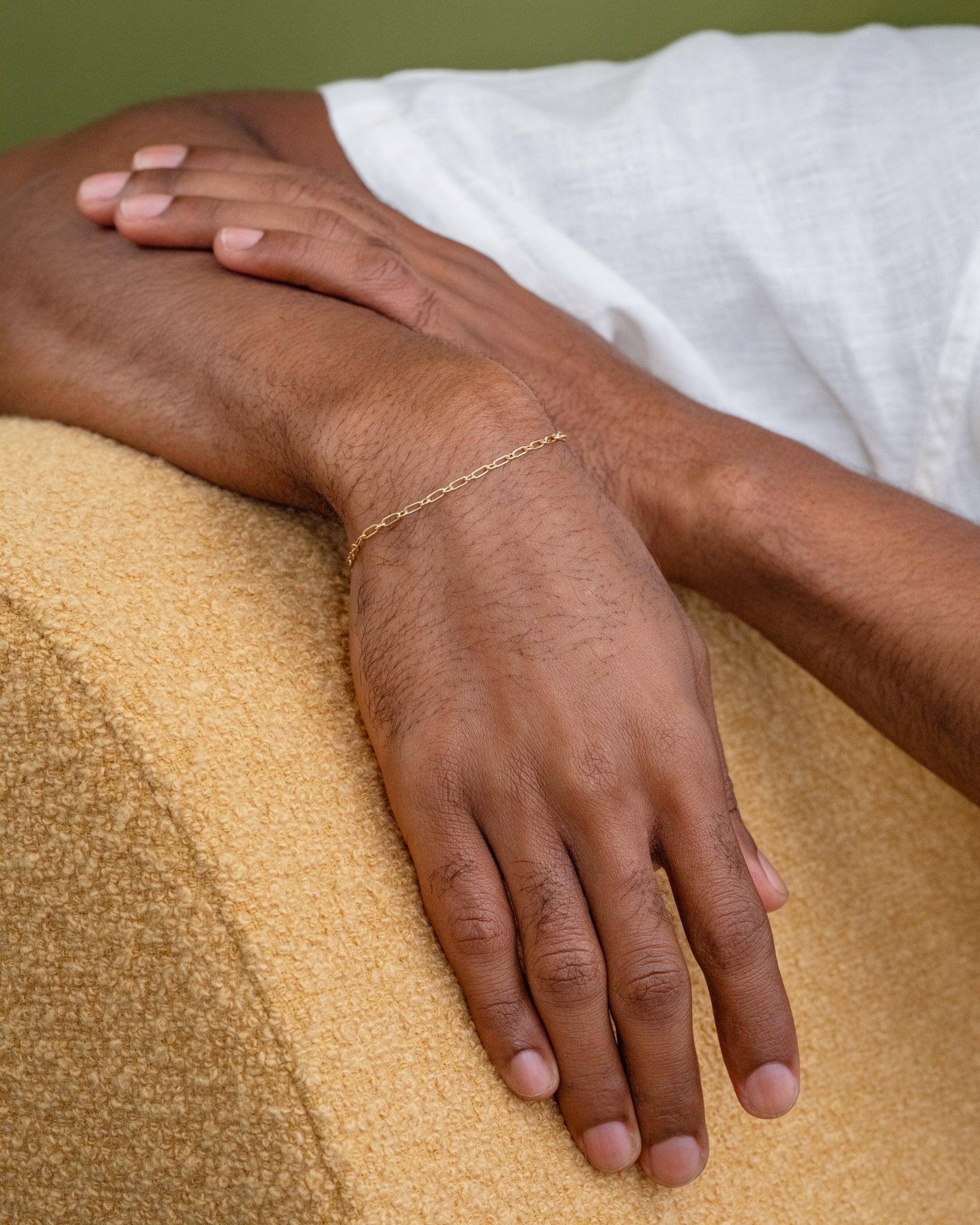 Hot Dog Chain Bracelet on male model.