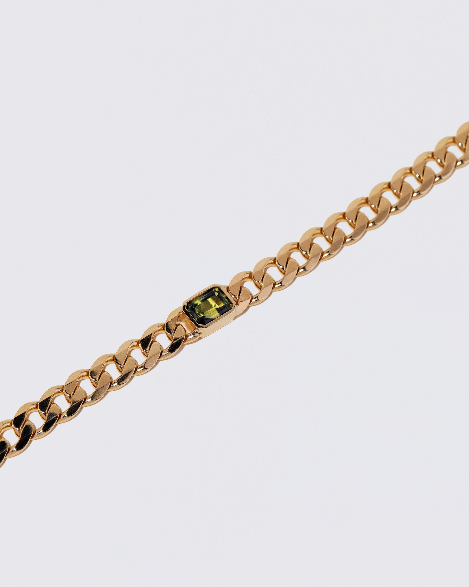 Closeup details of the Identity Chain Bicolor Sapphire Bracelet 001 on light color background.