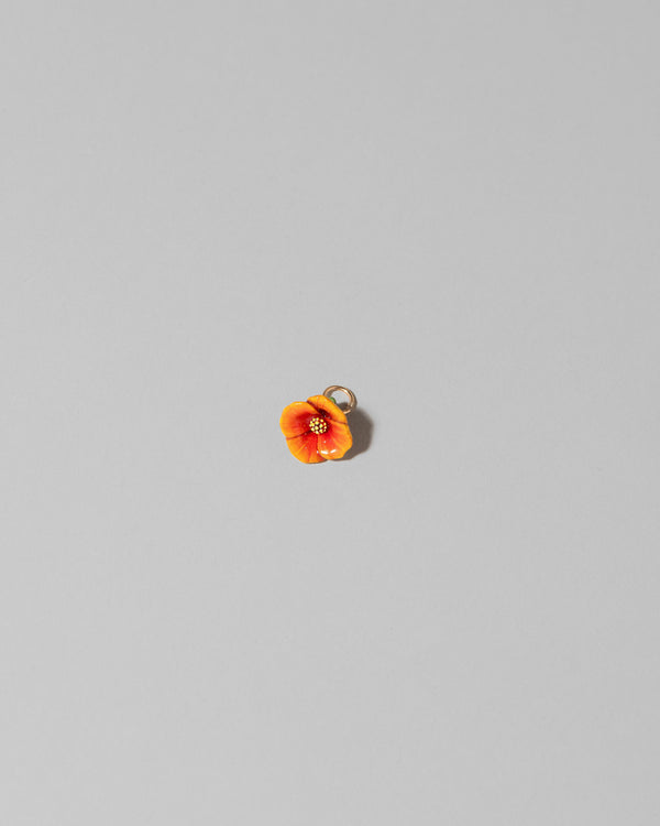California Poppy Charm on light color background.
