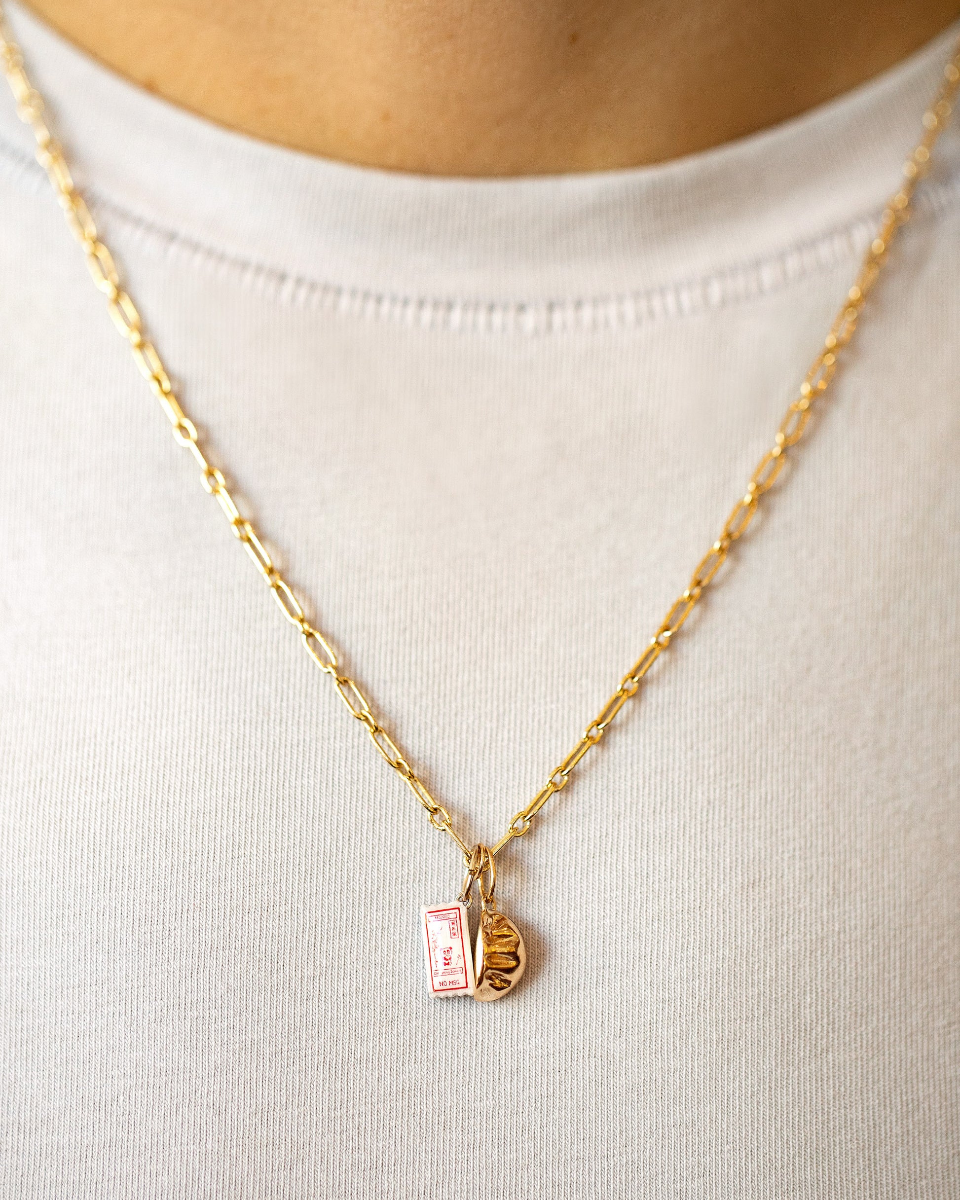 Hot Dog Chain Neclace, Dumpling Sauce Packet Charm and Steamed Dumpling Charm on model.