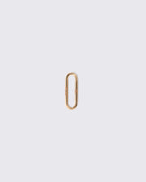 Solid Link Charm on light color background.