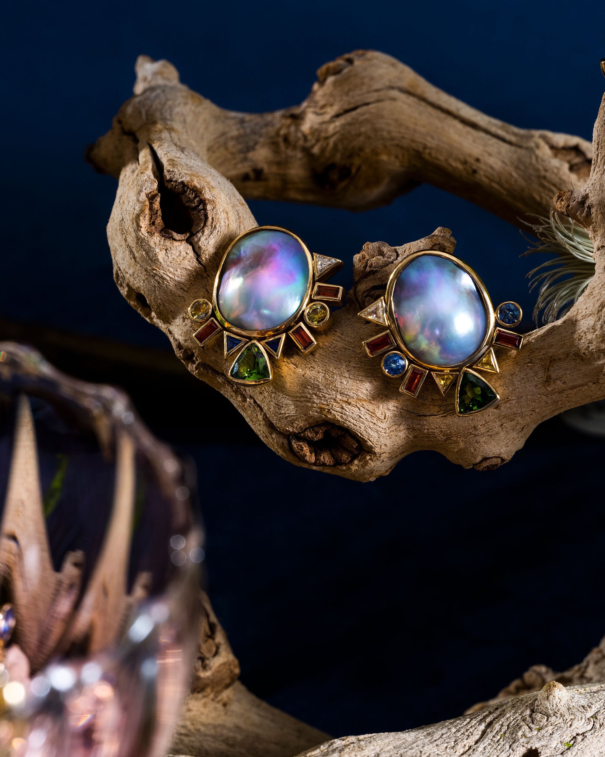 Styled image featuring the Cosmic Realm Earrings.