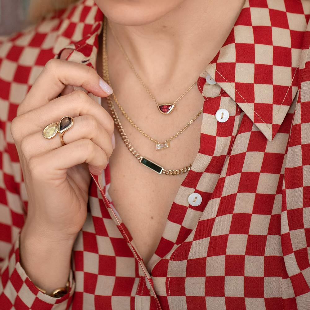 product_details::Lover's Kiss Necklace, Purity Necklace, Generosity Necklace and Illusion of Opposites Ring on model.