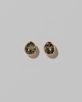 Juniper Studs on light color background.
