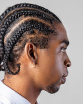 Gold Kink Hoop Earrings on male model.