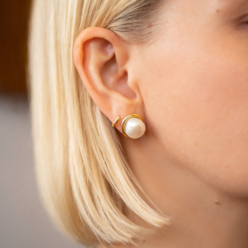 product_details::Nereus Earrings on model.