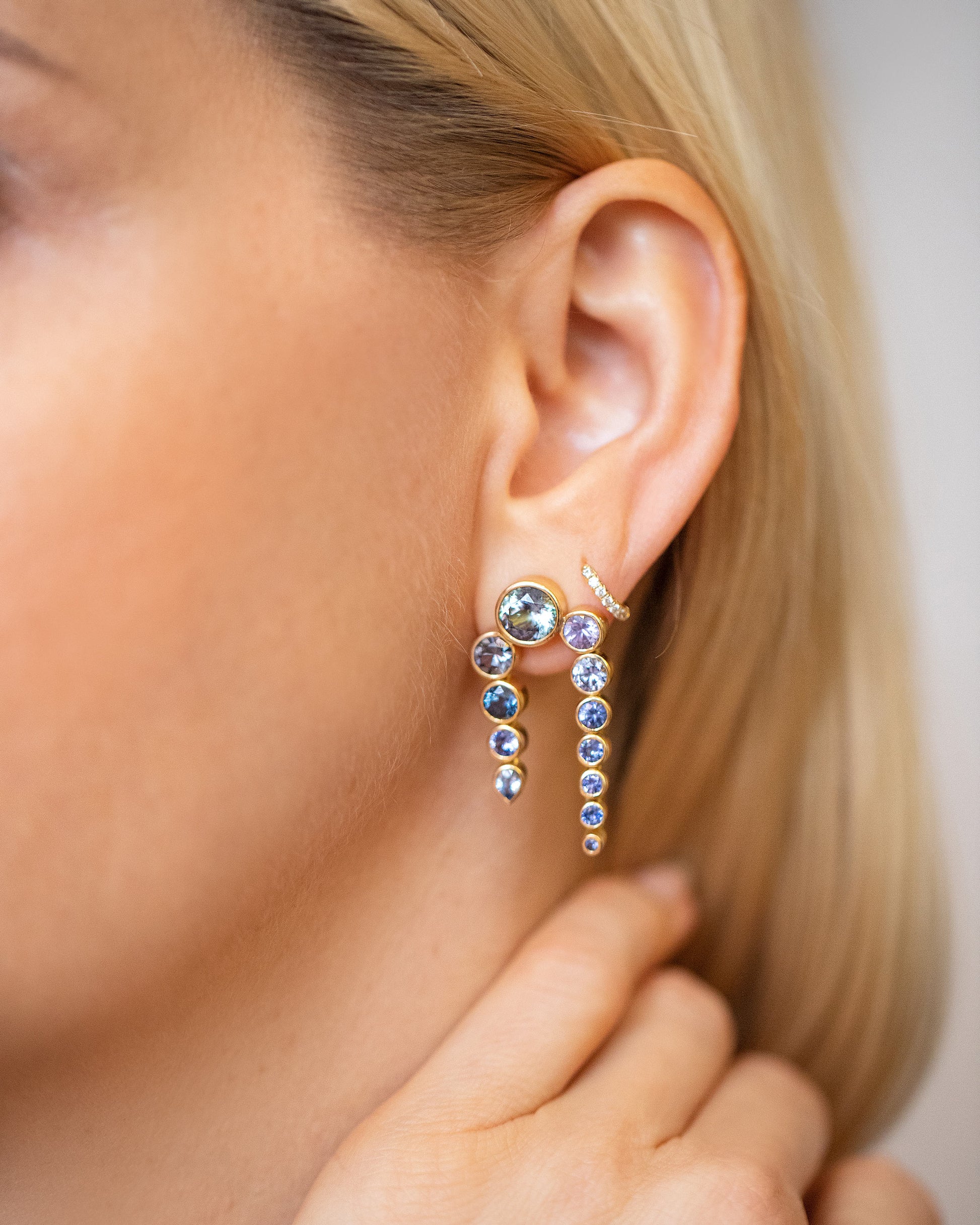 Passiflora Earrings on model.