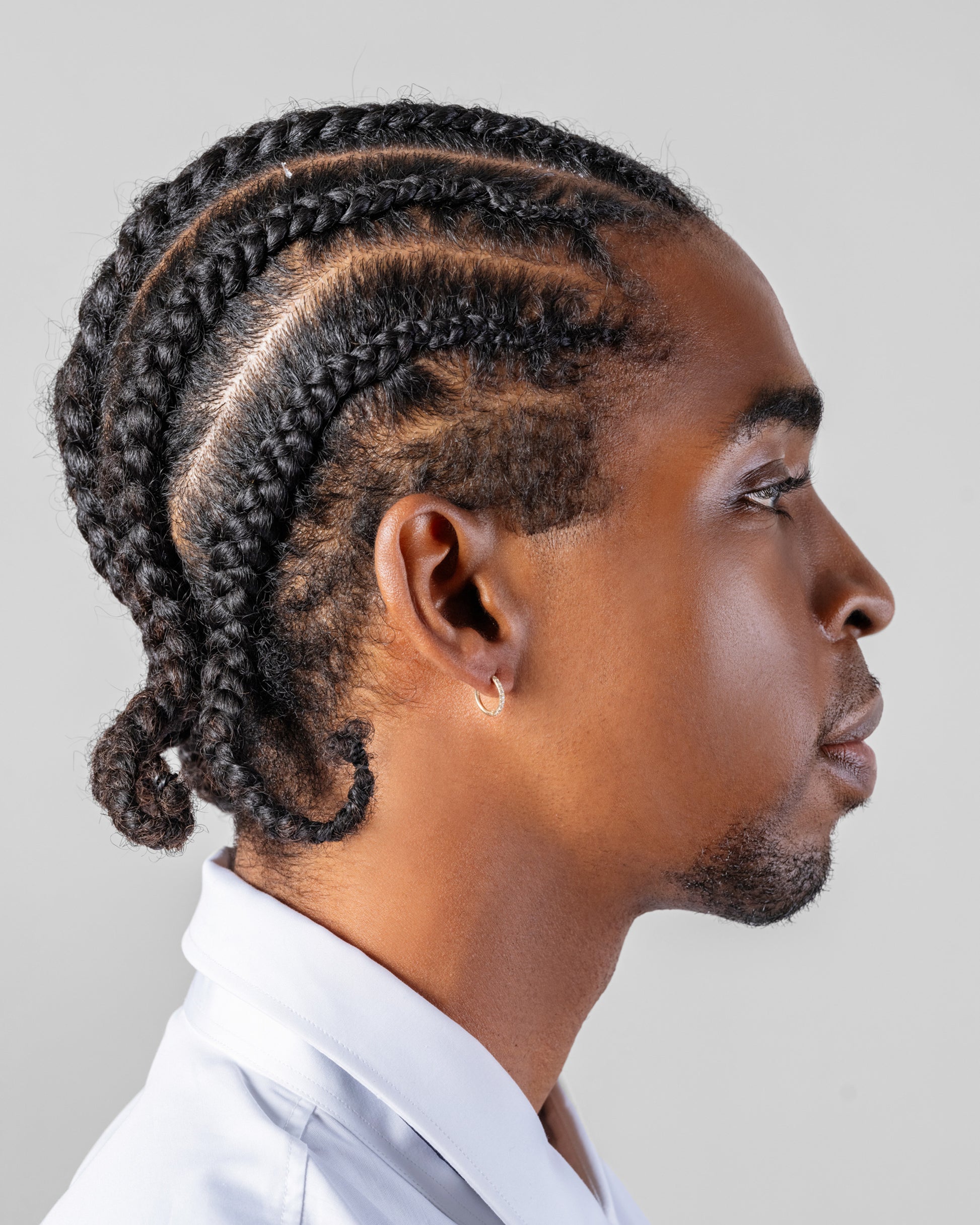Classic Gold Diamond Snack Hoop Earrings on male model.