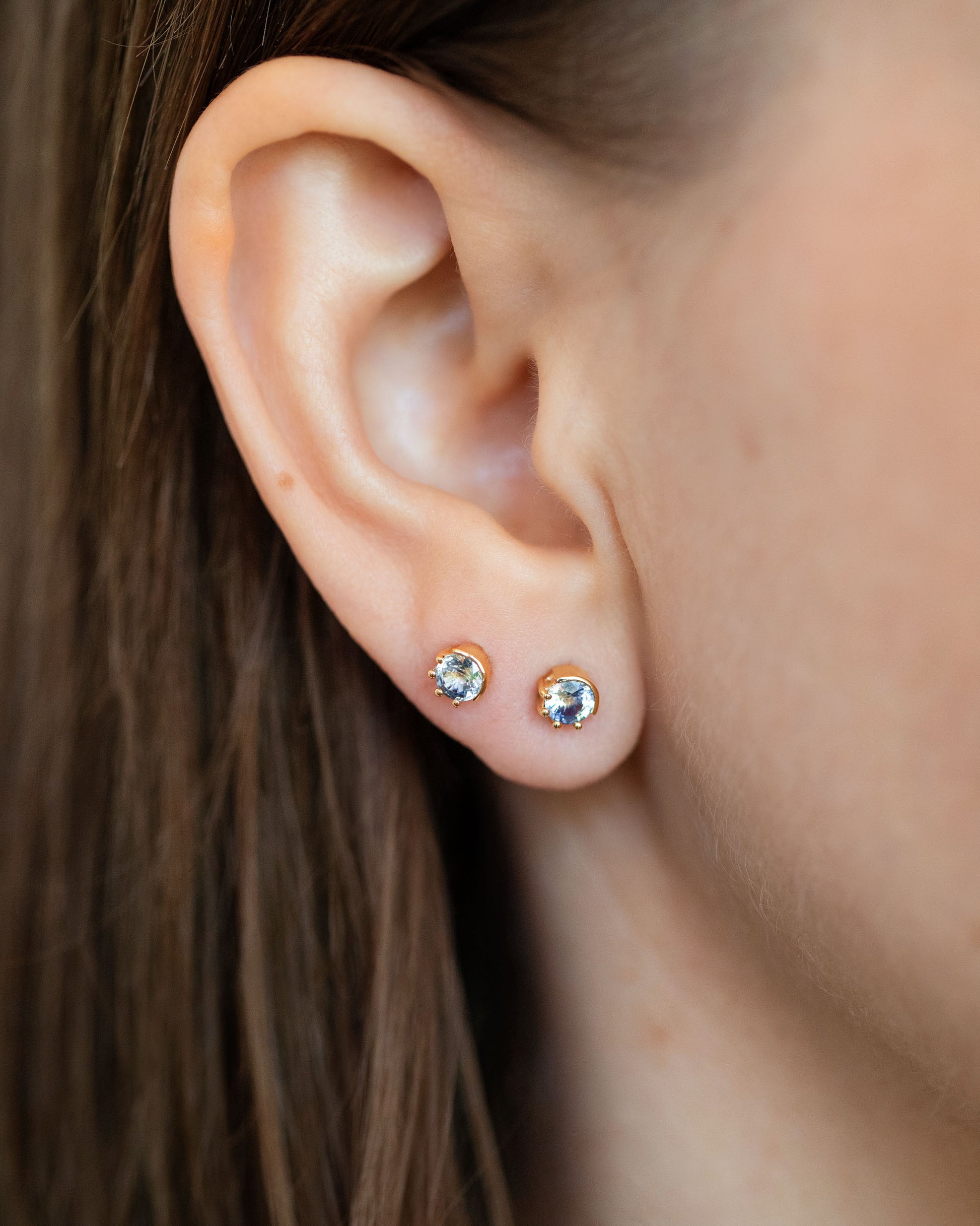 Bicolor Sapphire Sun & Moon Stud Earrings on model.