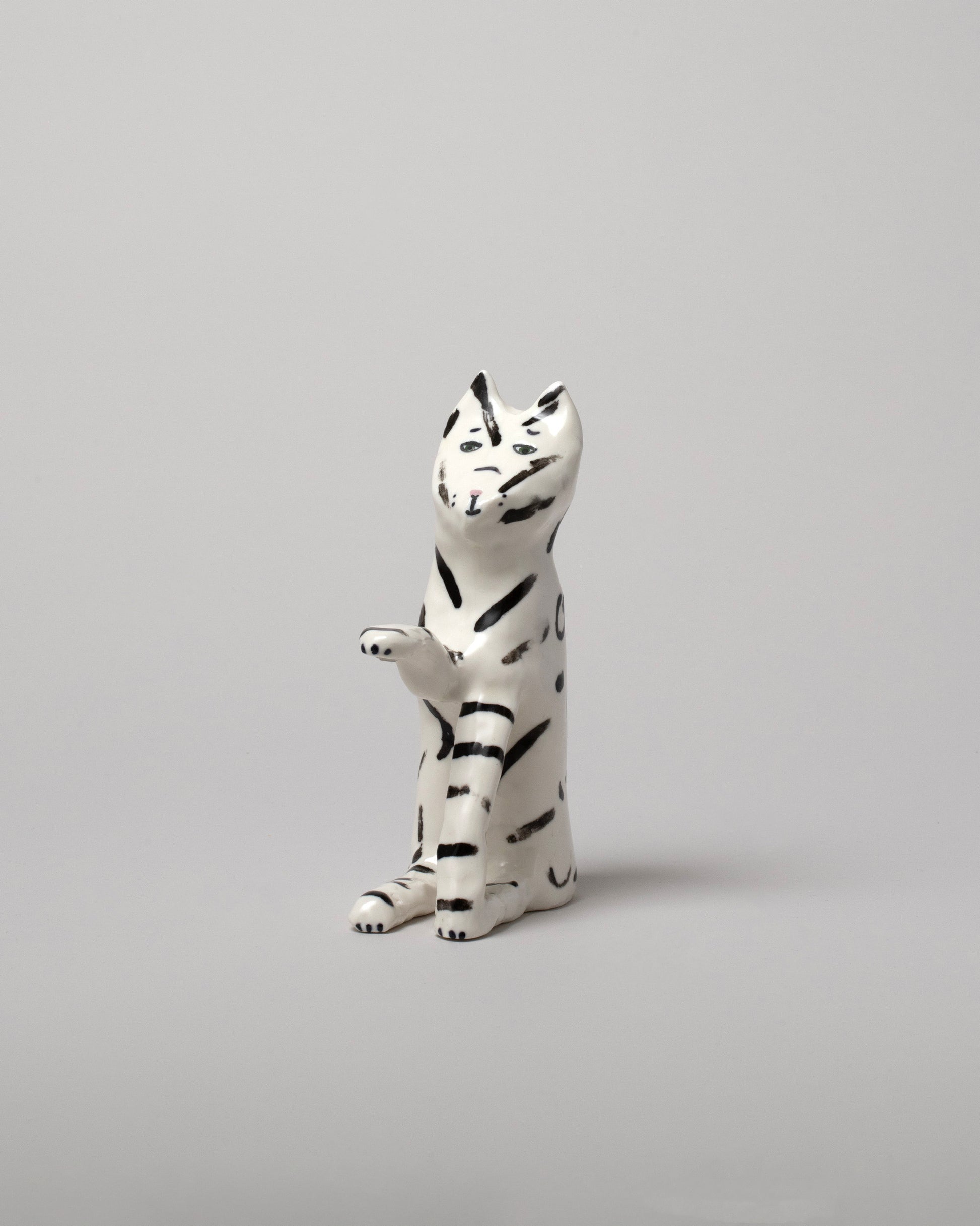 View from the side of the Eleonor Boström Black Key Cat on light color background.