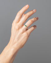 Emerald & Diamond Teardrop Ring on model.