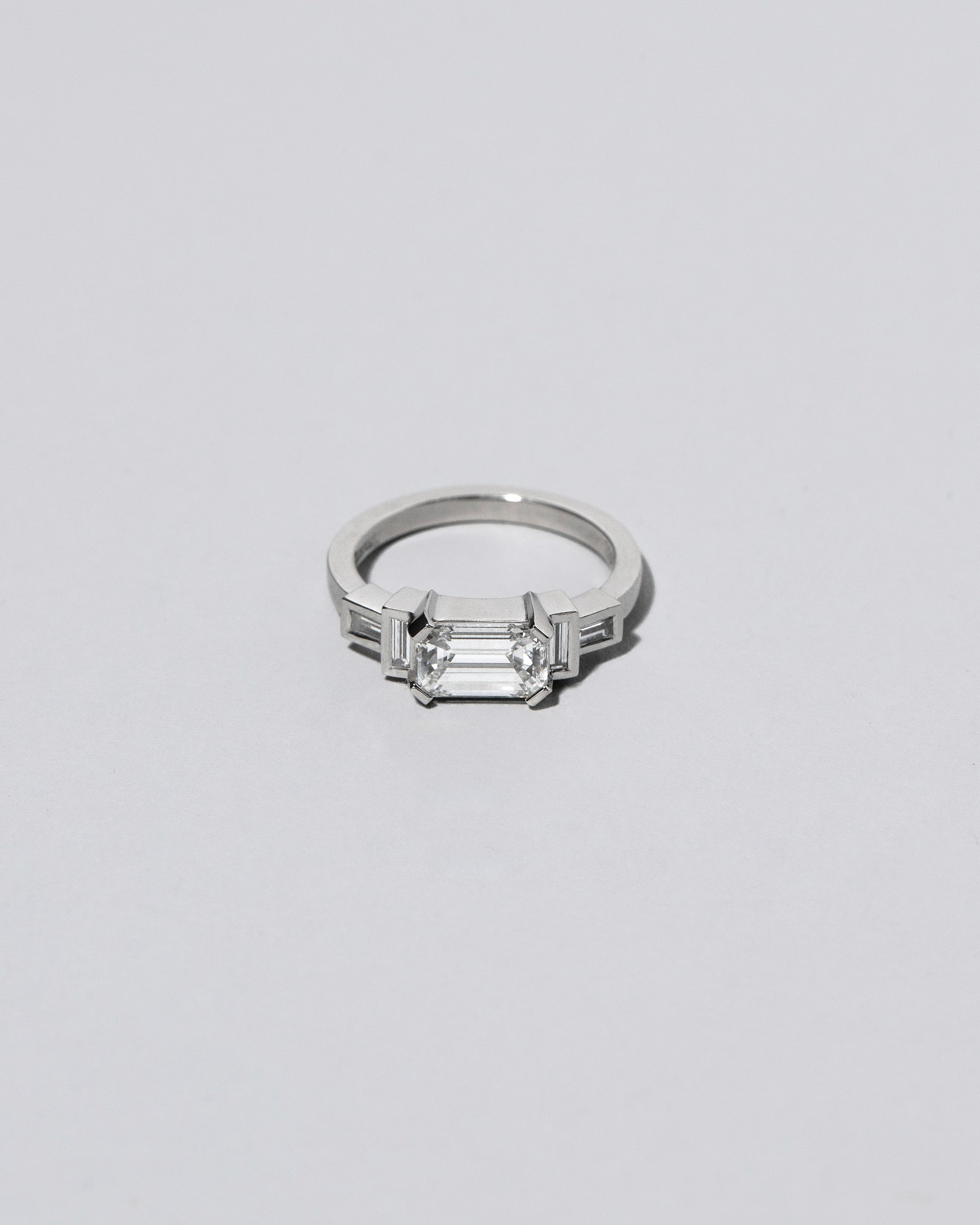 Platinum Expression Ring on light color background. Please note: This image represents a custom creation.