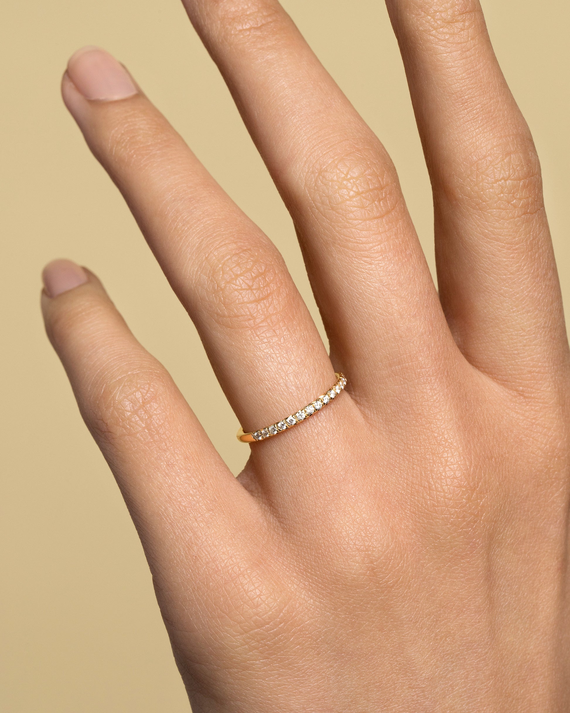 Gold White Diamond Fifteen Stone Dot Band on model.