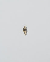 Morel Mushroom Charm on light color background.
