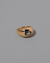 View from the side of the Bicolor Sapphire Jupiter Ring on light color background.