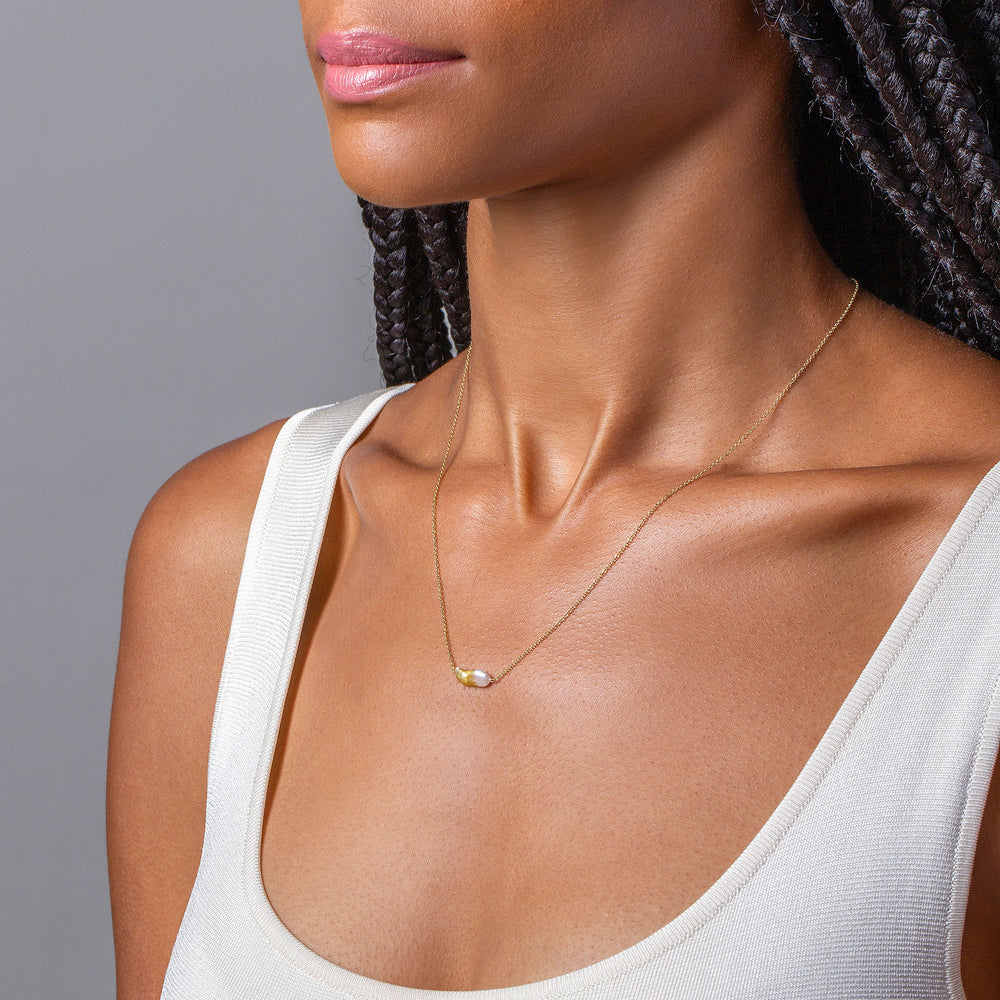 product_details::Lagniappe Pearl Necklace - White on model.