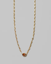 Closeup details of the Northern Lights Necklace 001 on light color background.